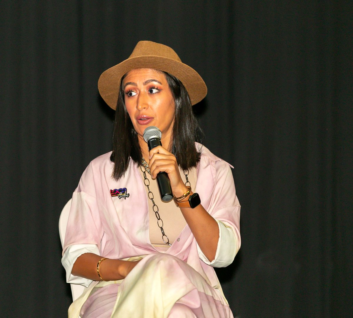 Sarah Alturk speaking on stage