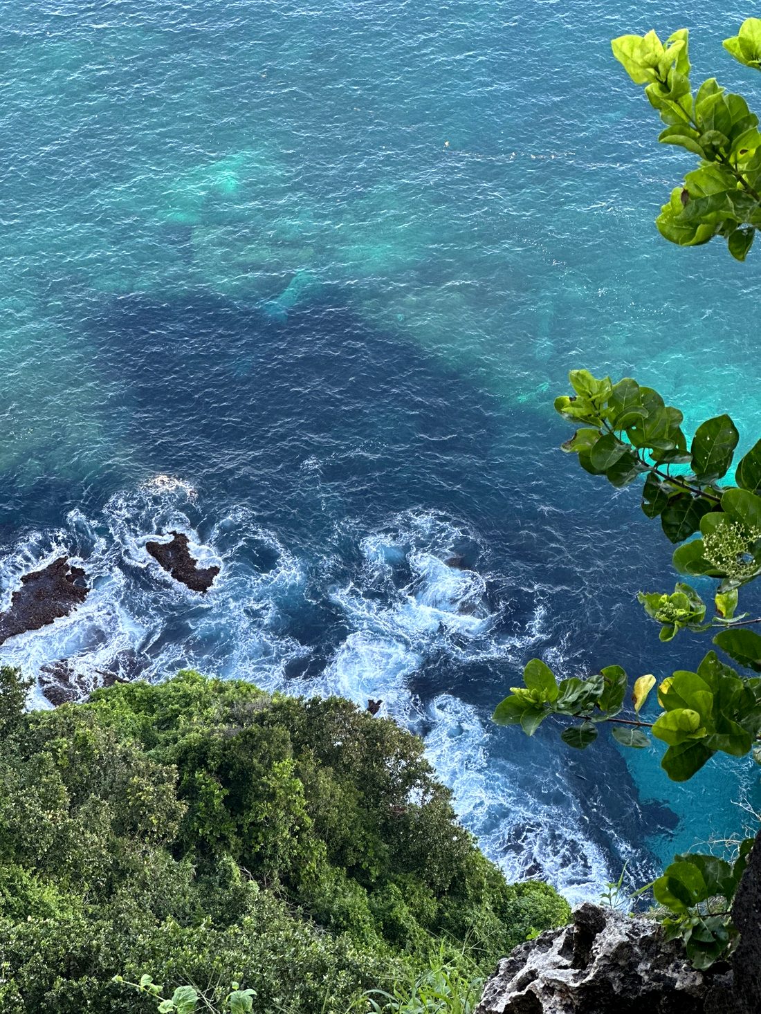 Cliff and turquoise water in Bali